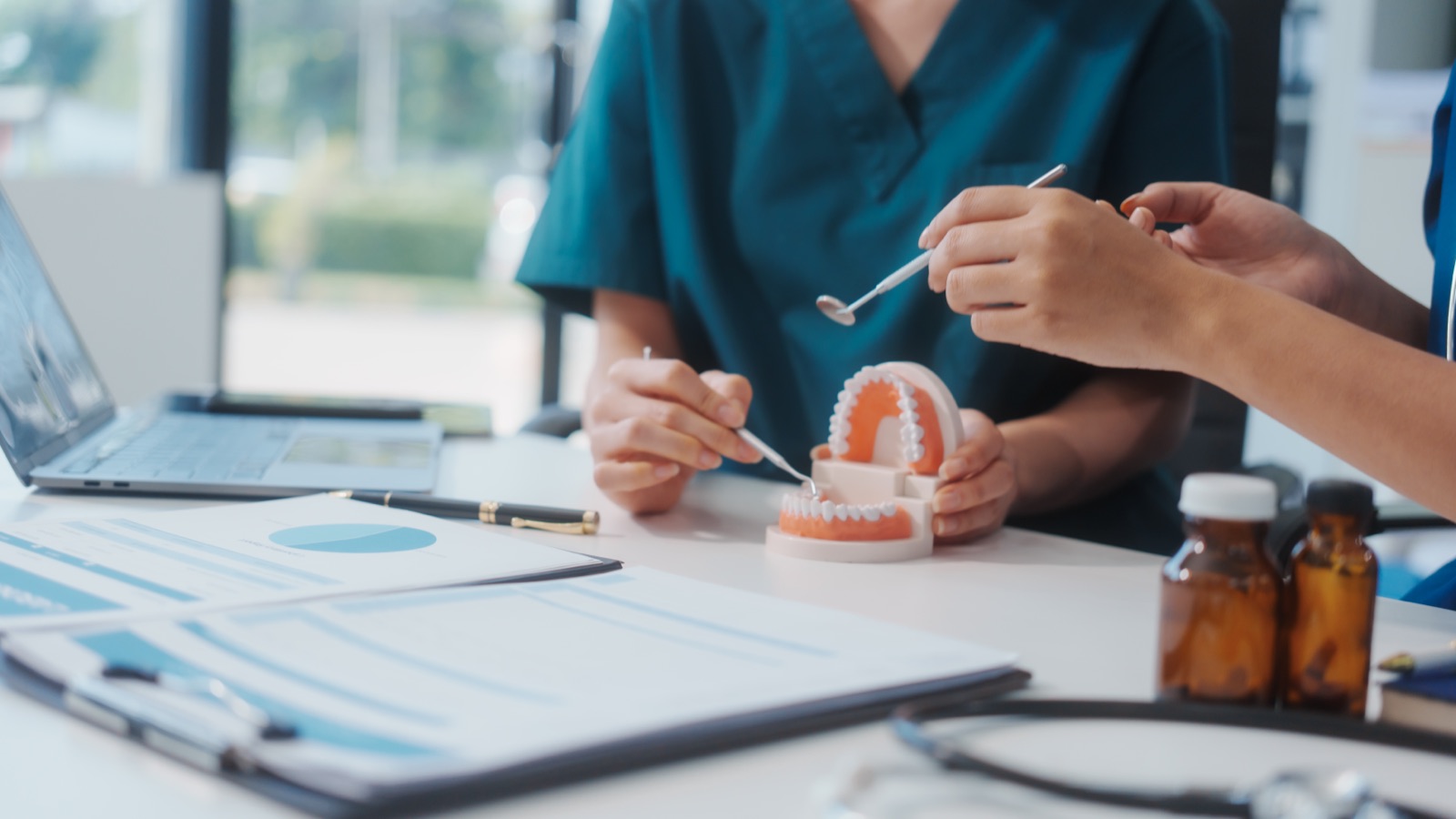 Reviewing a treatment plan with a dental model